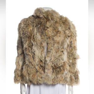 Fur Coyote Jacket
Stand Collar
Slit Pockets & Hook and Eye Closure